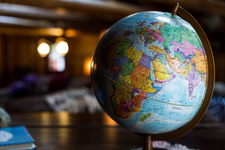 Image of a teacher's globe sitting inside on a desk